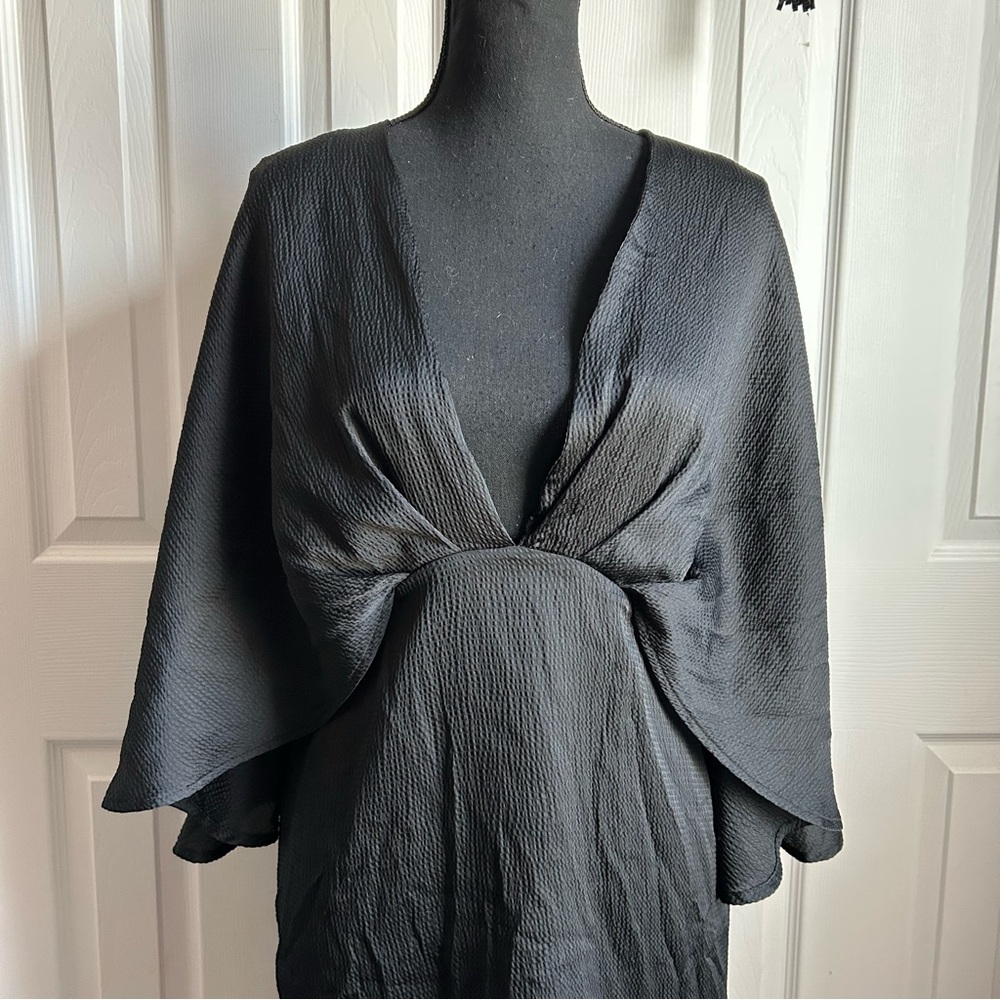 Vici black low cut mini dress with attached cape - Picture 2 of 6